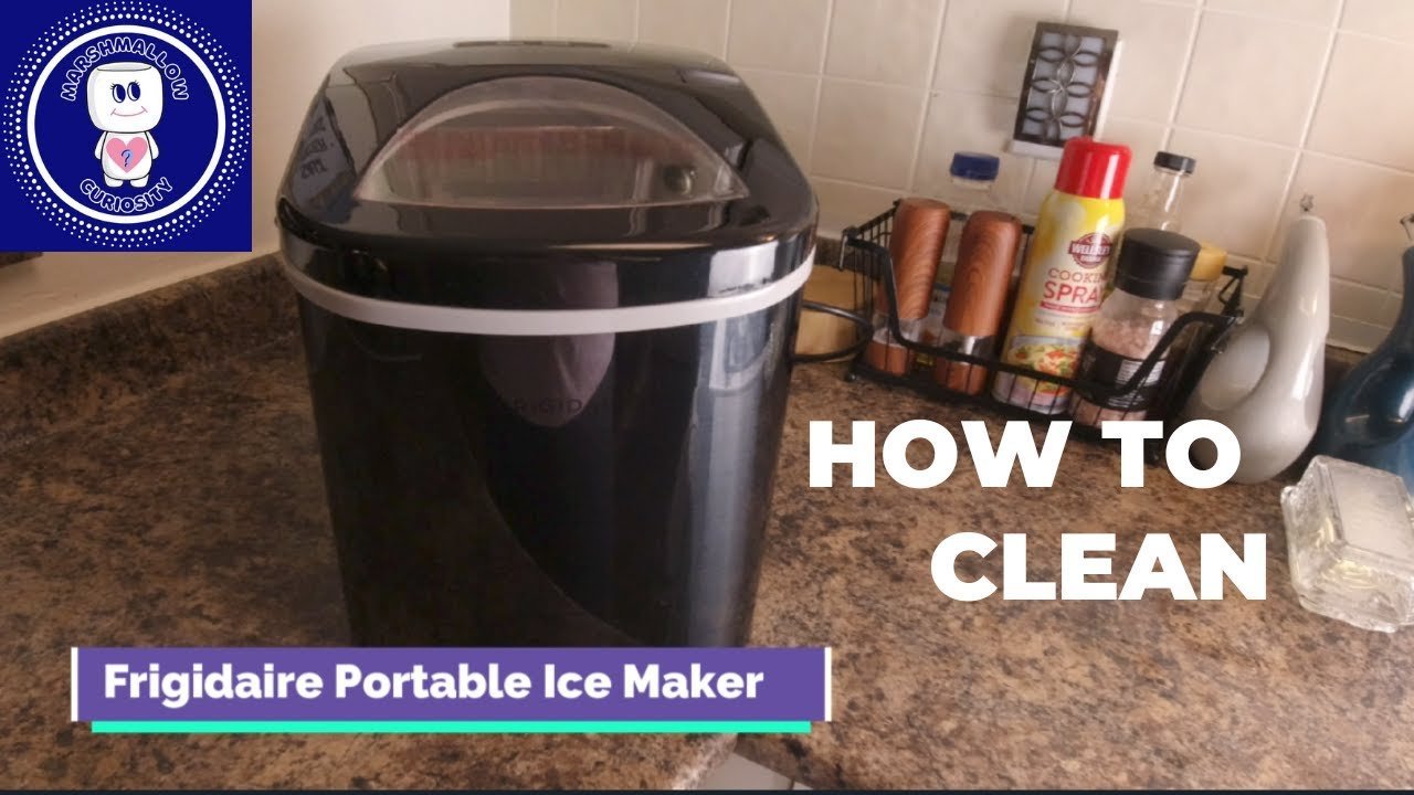 Household cleaning tools like vinegar and a brush for maintaining a Frigidaire ice maker.