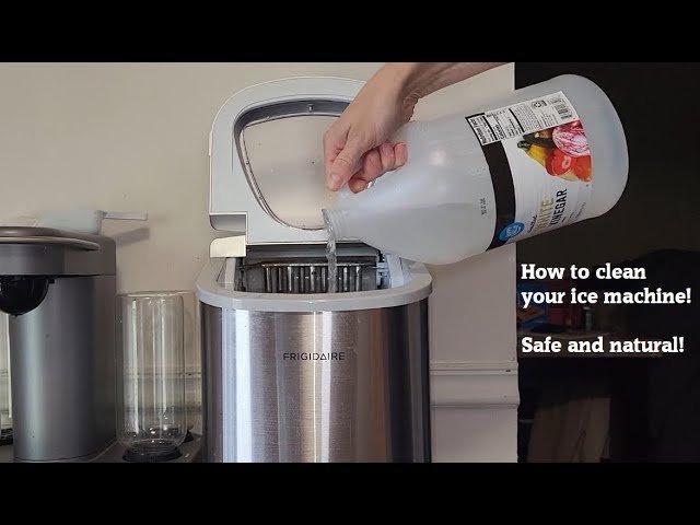 Essential cleaning supplies like white vinegar and a cloth for maintaining an ice maker.