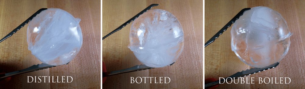 Professional cocktail tools displayed on a marble counter for making clear ice.