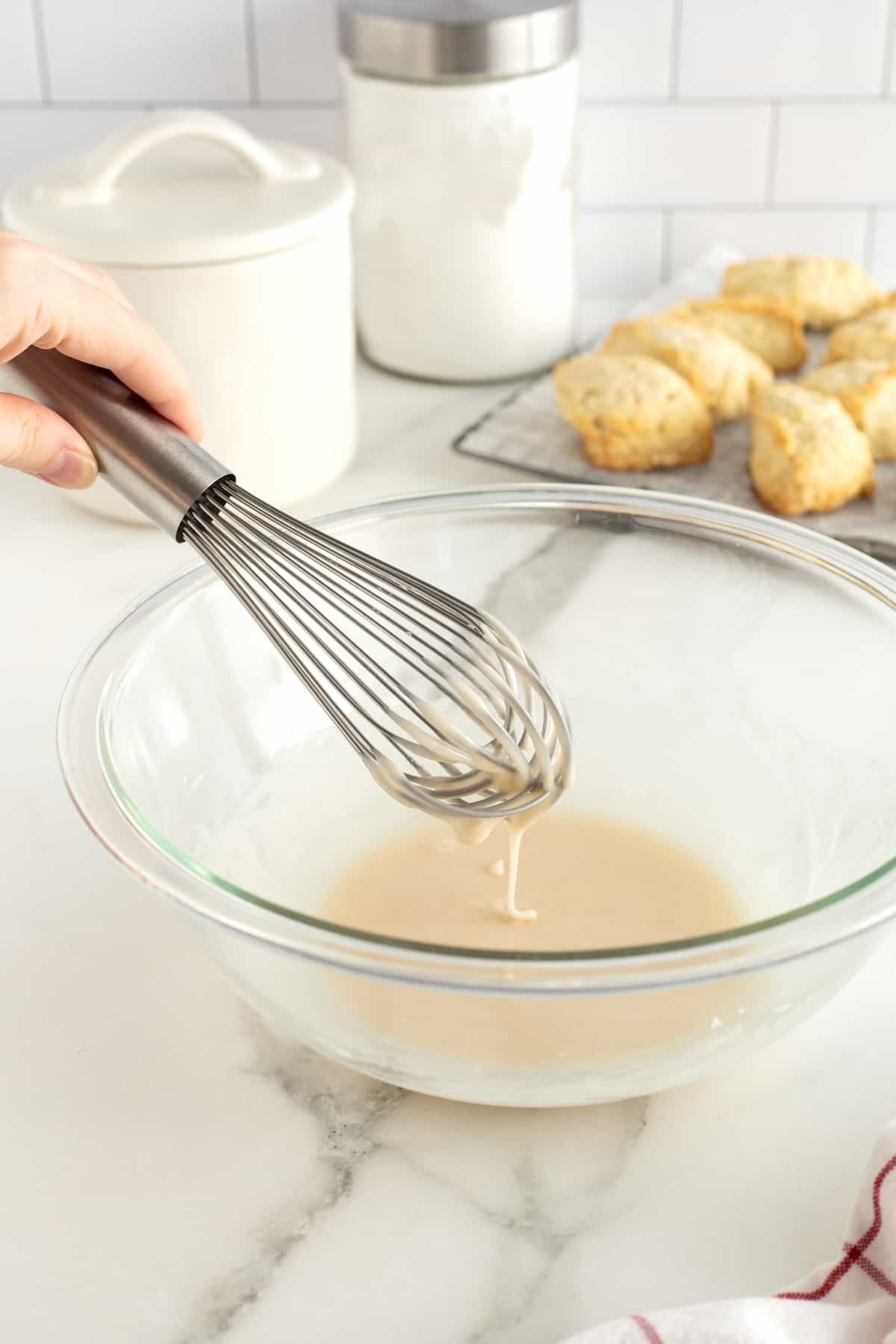 Fine powdered sugar in a glass jar ready for making homemade icing.
